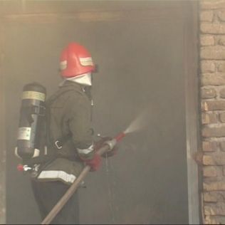 آتش نشانی نیشابور - آتش در زغال فروشی