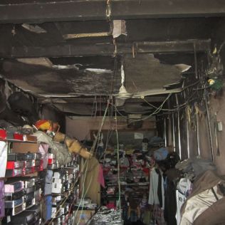 آتش نشانی نیشابور - آتش سوزی مغازه پوشاک