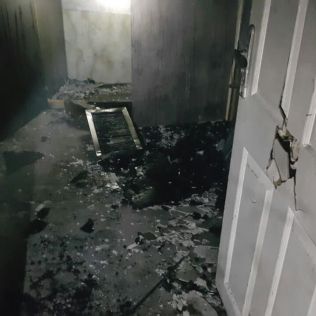 آتش نشانی نیشابور - مهار آتش سوزی منزل مسکونی واقع در خیابان شهید طاهری