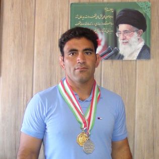 آتش نشانی نیشابور - یک طلا و یک نقره حاصل تلاش آتش نشان نیشابوری در مسابقات کشتی پهلوانی کشور